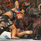 Cyborg scoring a dominant win over Gina Carano. Image credit: Jon Kopaloff/Getty.